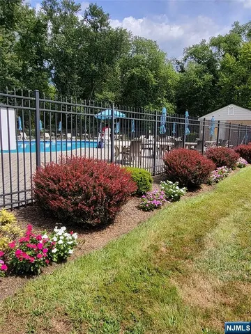 a view of a garden with a lake