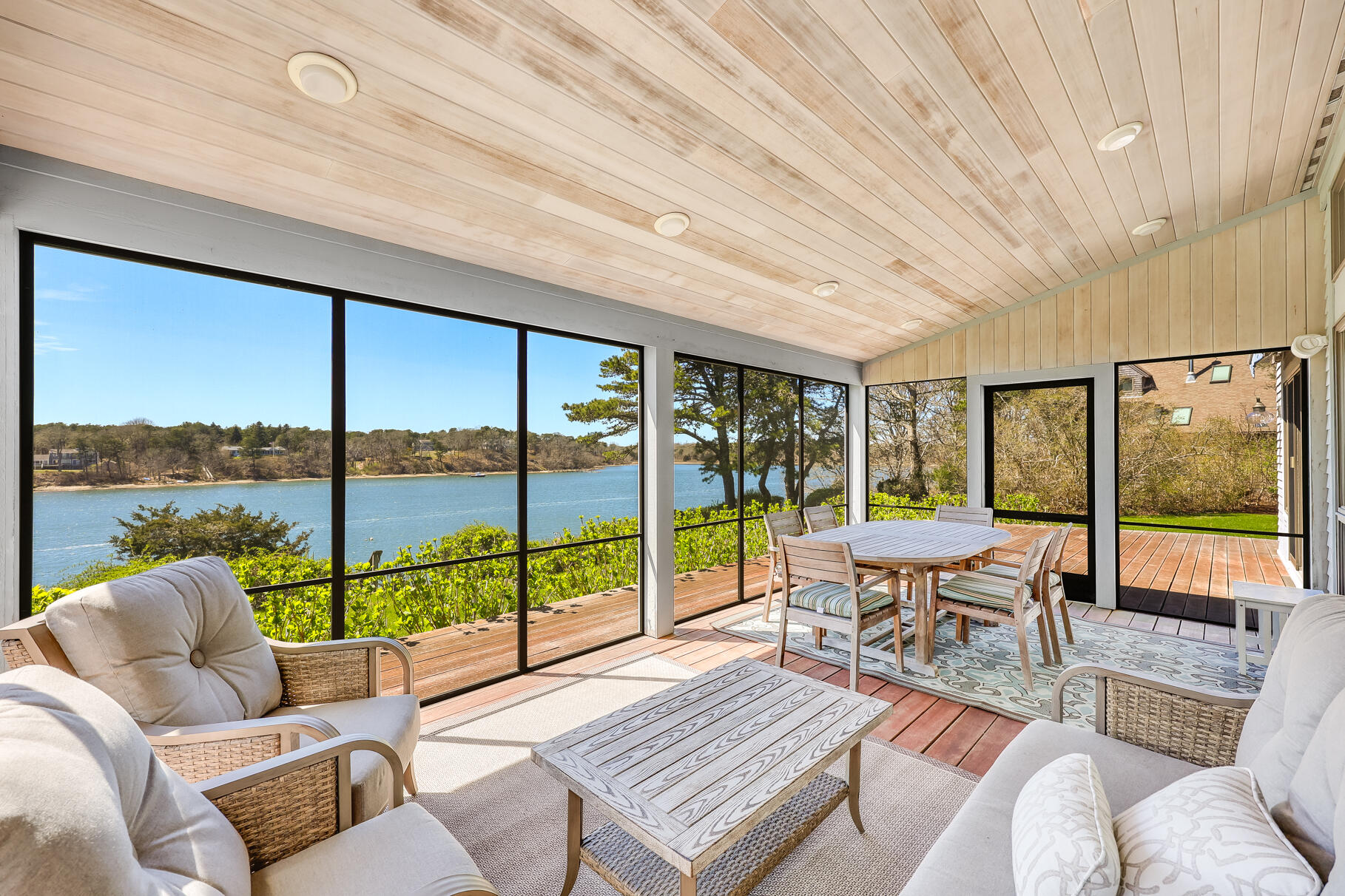 34 Jack Knife Point Road Orleans, MA 02653 - Photo 16 of 56 a living room with furniture city view