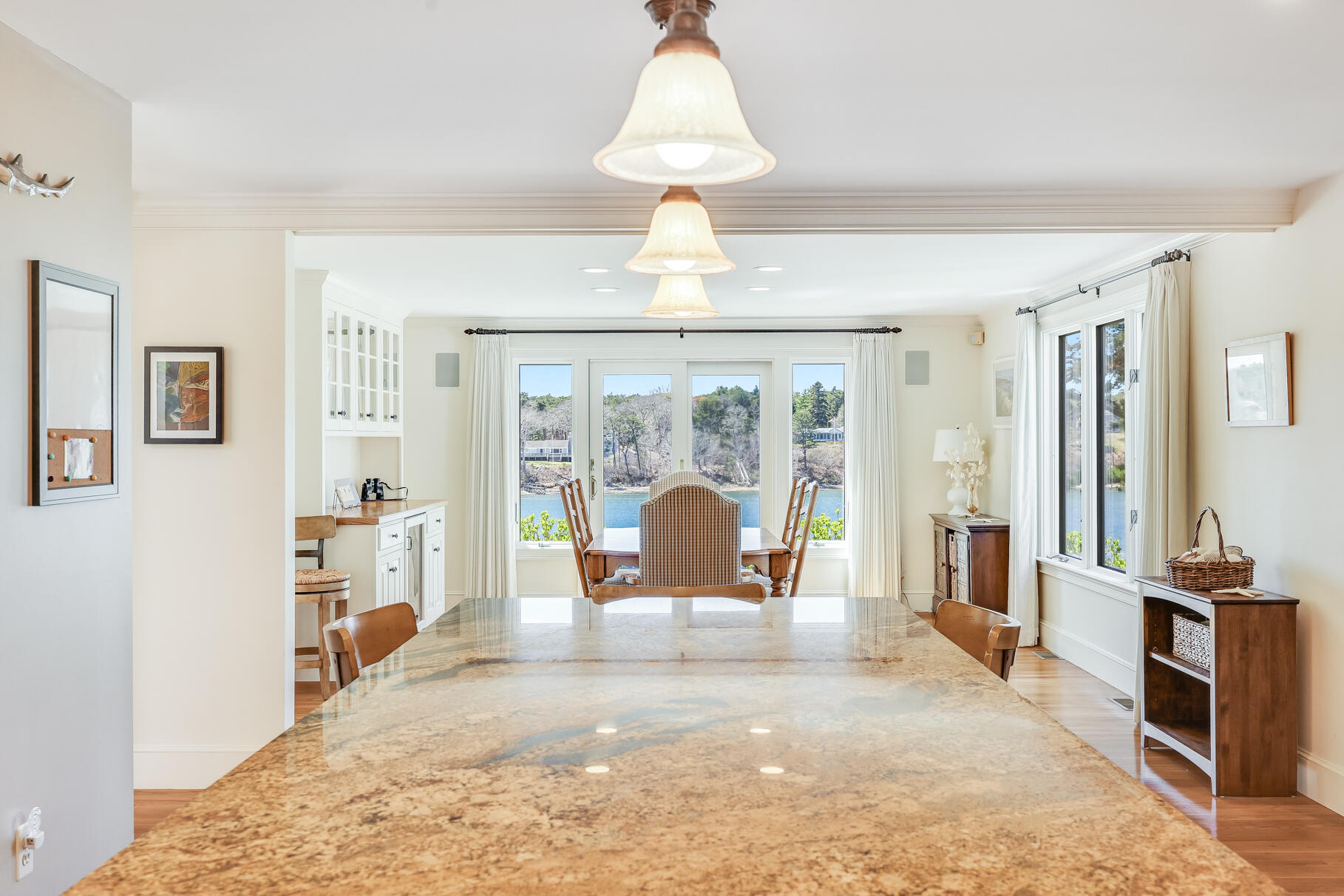 34 Jack Knife Point Road Orleans, MA 02653 - Photo 20 of 56 a view of an empty room with wooden floor and a window