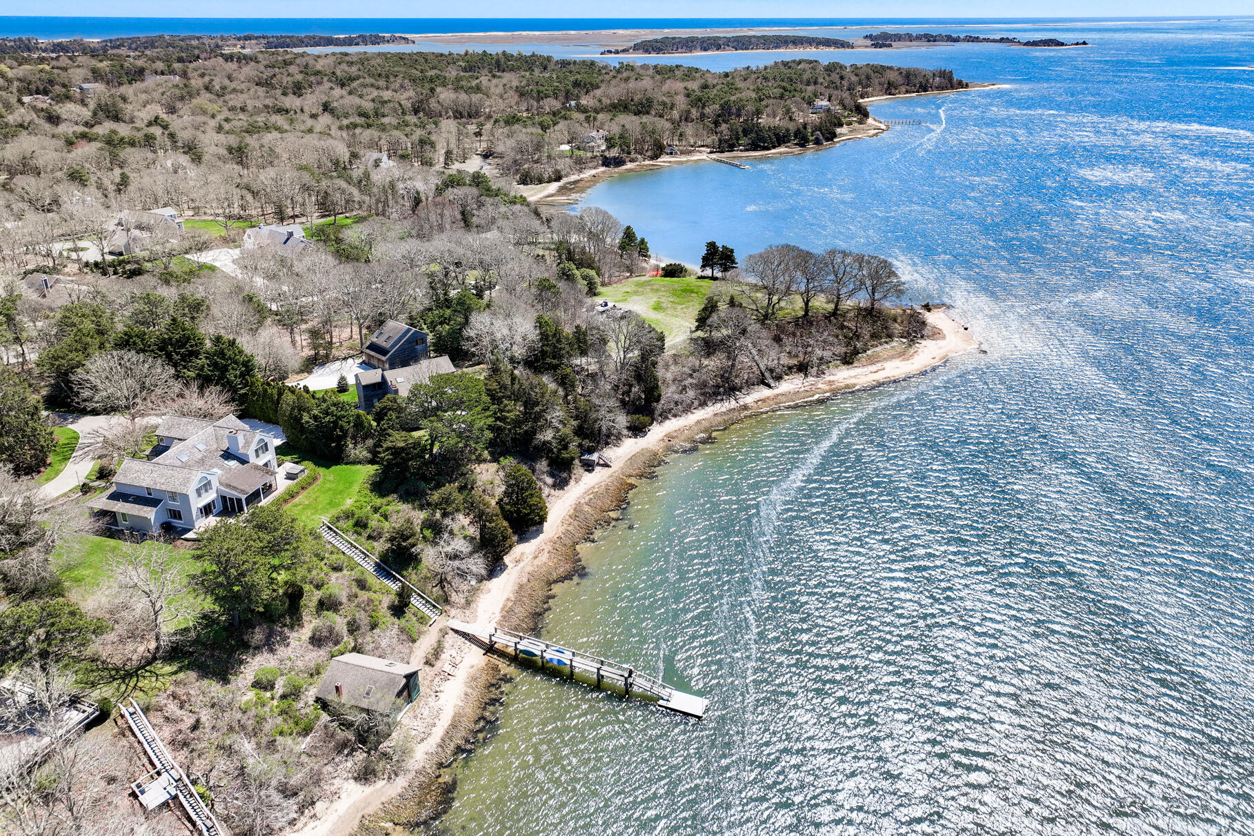 34 Jack Knife Point Road Orleans, MA 02653 - Photo 2 of 56 a view of a houses with a yard