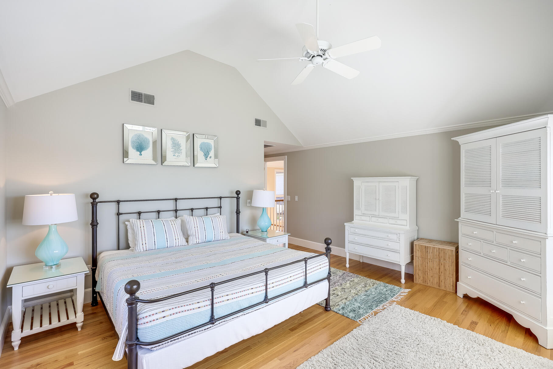 34 Jack Knife Point Road Orleans, MA 02653 - Photo 29 of 56 a spacious bedroom with a bed and a dresser