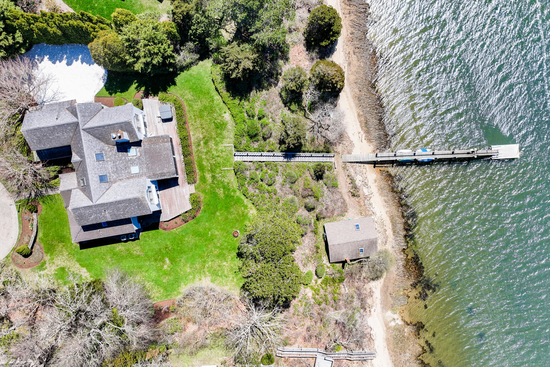 34 Jack Knife Point Road Orleans, MA 02653 - Photo 3 of 56 an aerial view of residential house with outdoor space and swimming pool