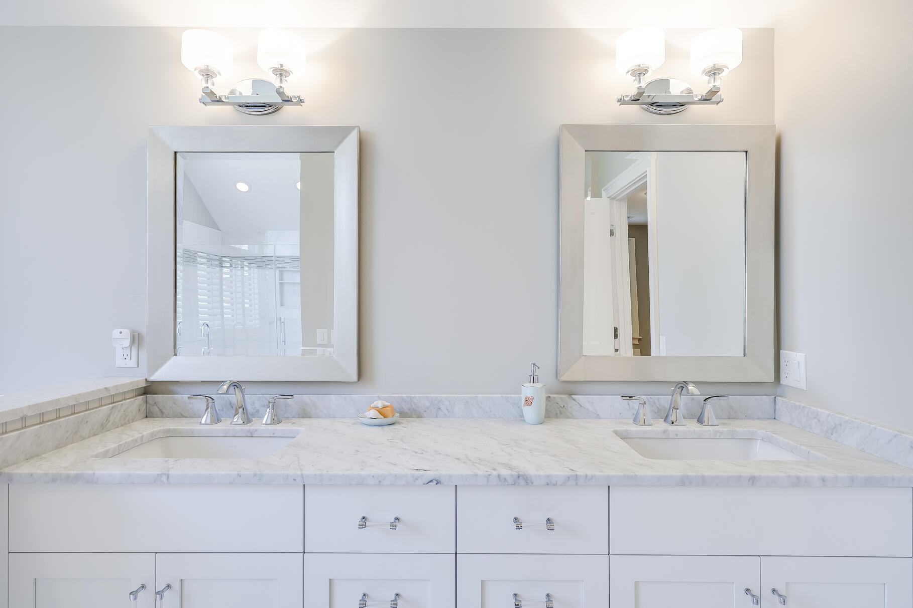 34 Jack Knife Point Road Orleans, MA 02653 - Photo 31 of 56 a bathroom with double sink and a mirror