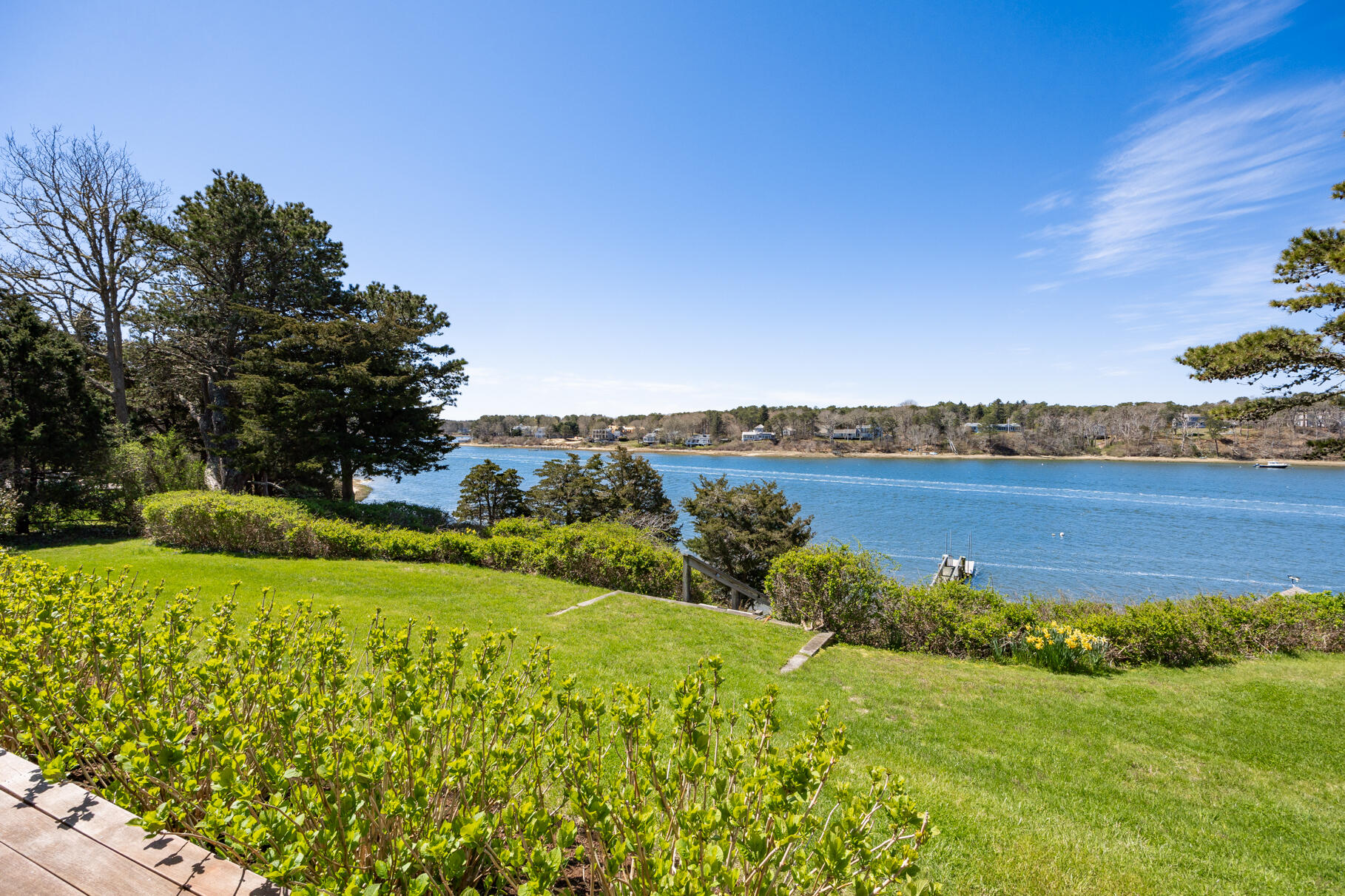 34 Jack Knife Point Road Orleans, MA 02653 - Photo 38 of 56 a view of a lake with houses in the back