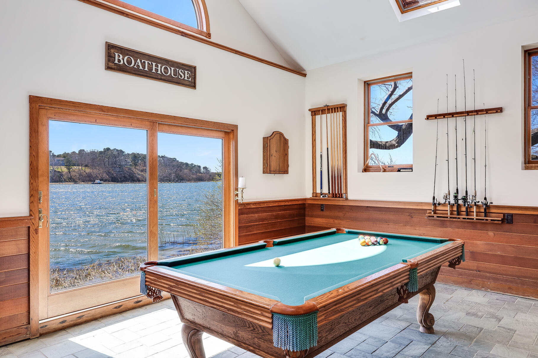 34 Jack Knife Point Road Orleans, MA 02653 - Photo 41 of 56 a room with pool table and windows