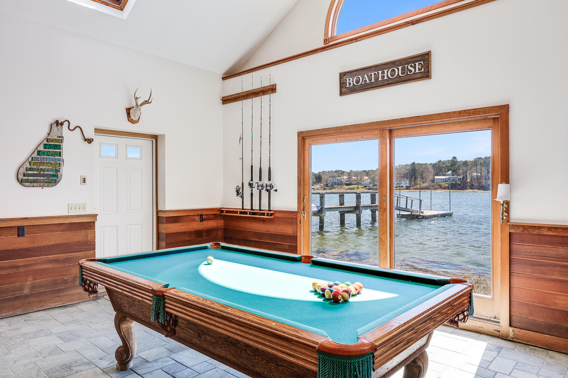 34 Jack Knife Point Road Orleans, MA 02653 - Photo 42 of 56 a room with pool table and windows