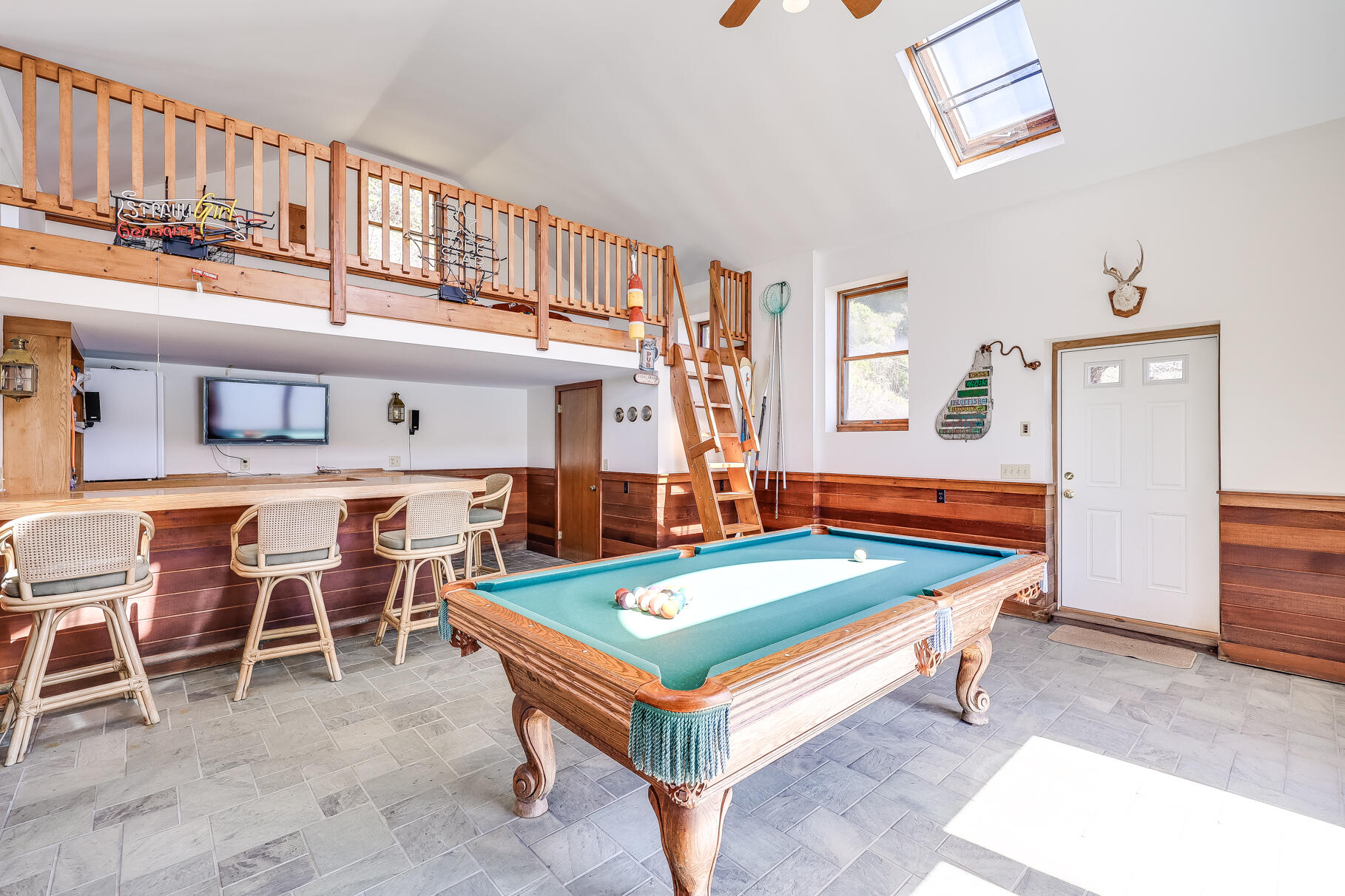 34 Jack Knife Point Road Orleans, MA 02653 - Photo 44 of 56 a room with table tennis pool table and windows