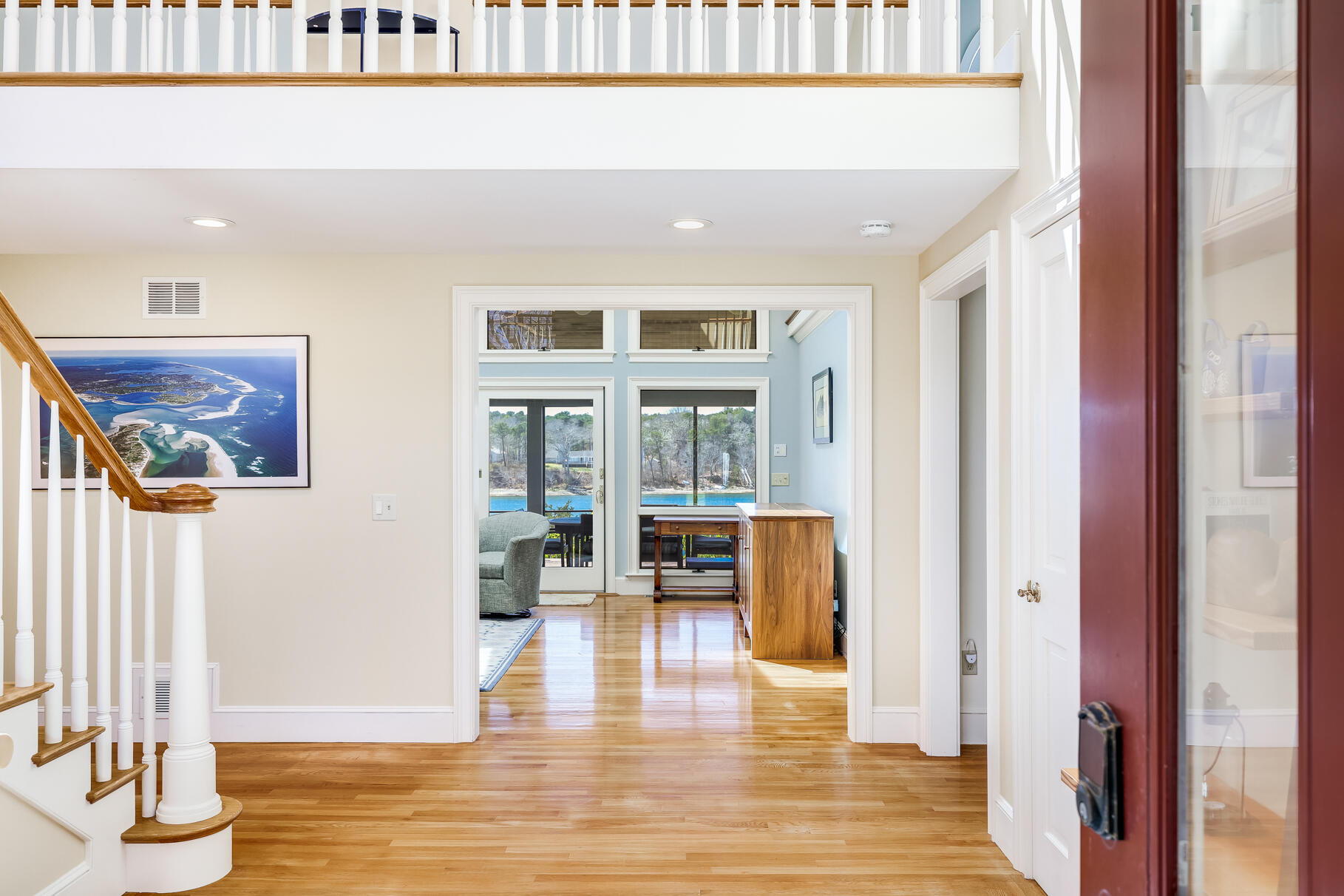 34 Jack Knife Point Road Orleans, MA 02653 - Photo 10 of 56 a view of a living room with furniture and large window