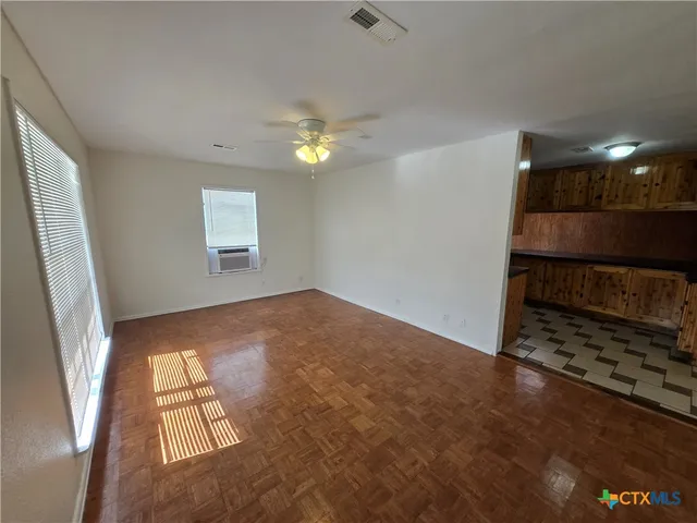 an empty room with windows