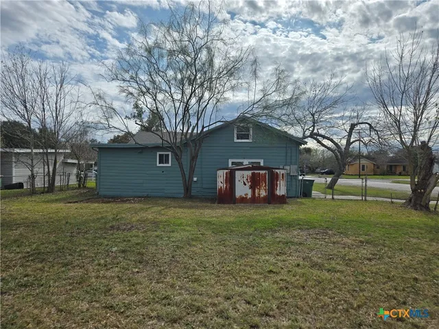 a house view with a outdoor space