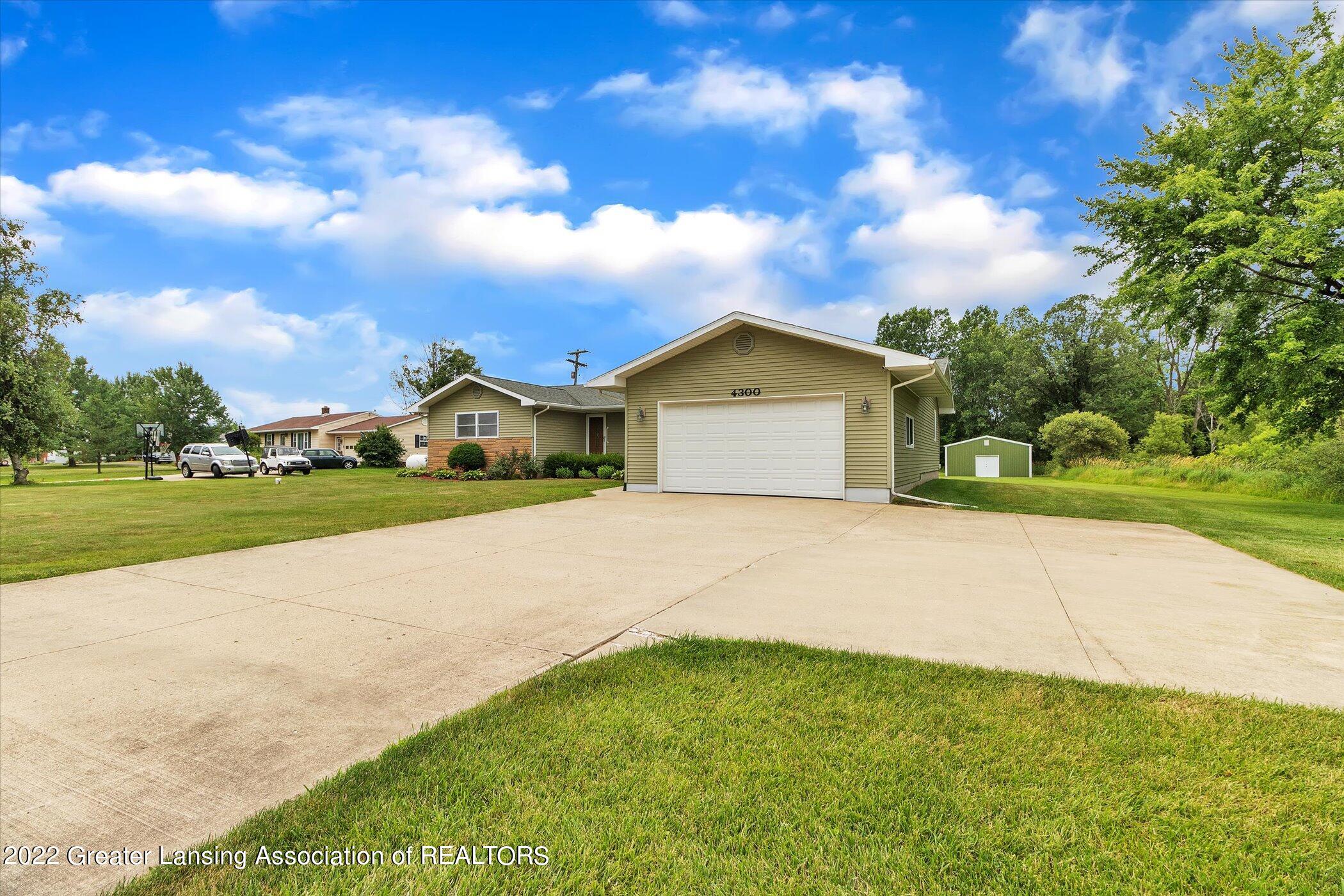 4300 South Cochran Road Charlotte, MI 48813 - Photo 4 of 75 04-4300-S-Cochran-Ave-WindowStill-Real-E