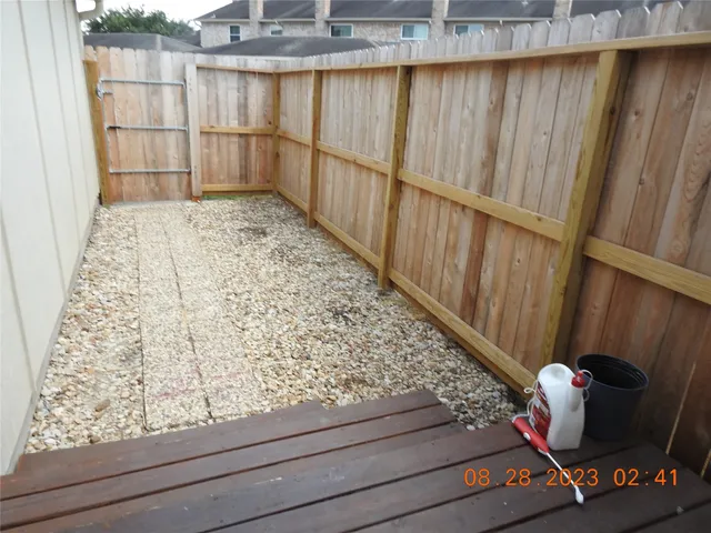 a bathroom with a shower and a sink