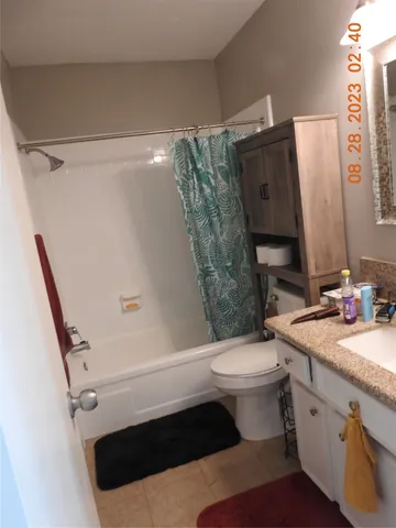 a view of small space with refrigerator