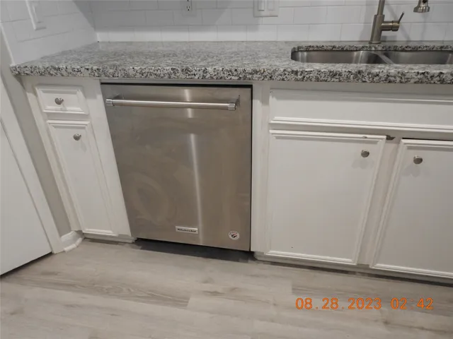a view of a utility room with washer and dryer