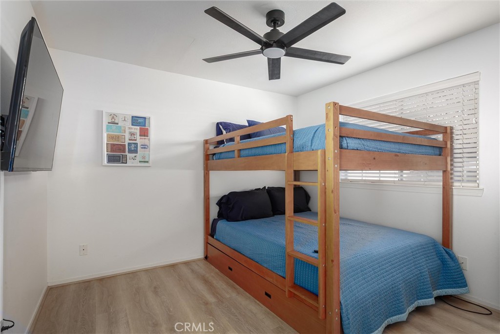 341 North 4th Street Grover Beach, CA 93433 - Photo 17 of 33 a bedroom with bed and a window