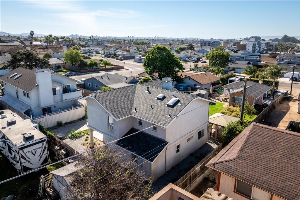 341 North 4th Street Grover Beach, CA 93433 - Photo 26 of 33 an aerial view of a city with lots of residential buildings