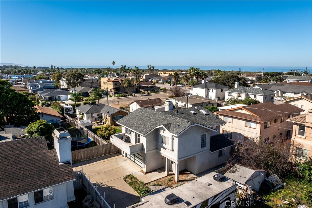 341 North 4th Street Grover Beach, CA 93433 - Photo 30 of 33 an aerial view of residential houses with outdoor space