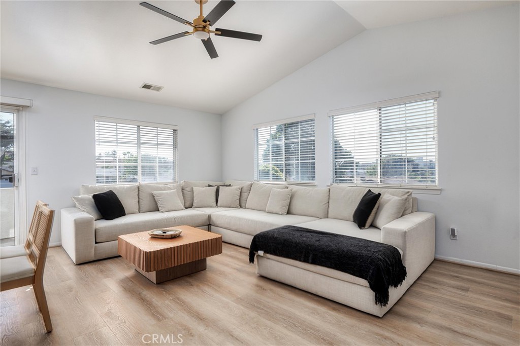341 North 4th Street Grover Beach, CA 93433 - Photo 6 of 33 a living room with furniture and a large window
