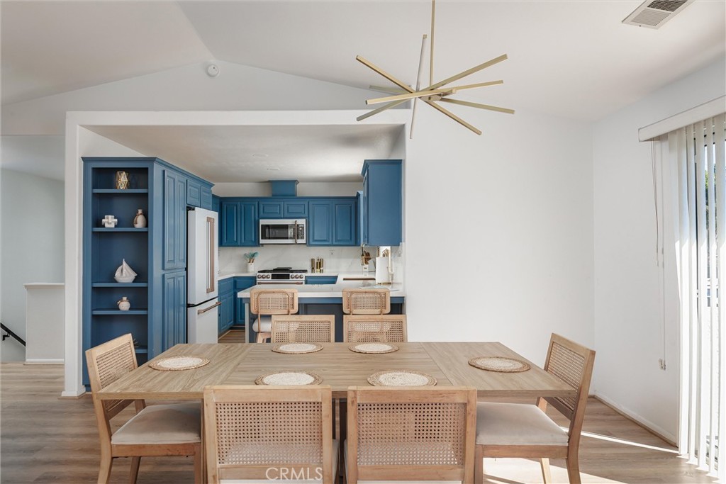 341 North 4th Street Grover Beach, CA 93433 - Photo 10 of 33 a kitchen with a table and chairs in it