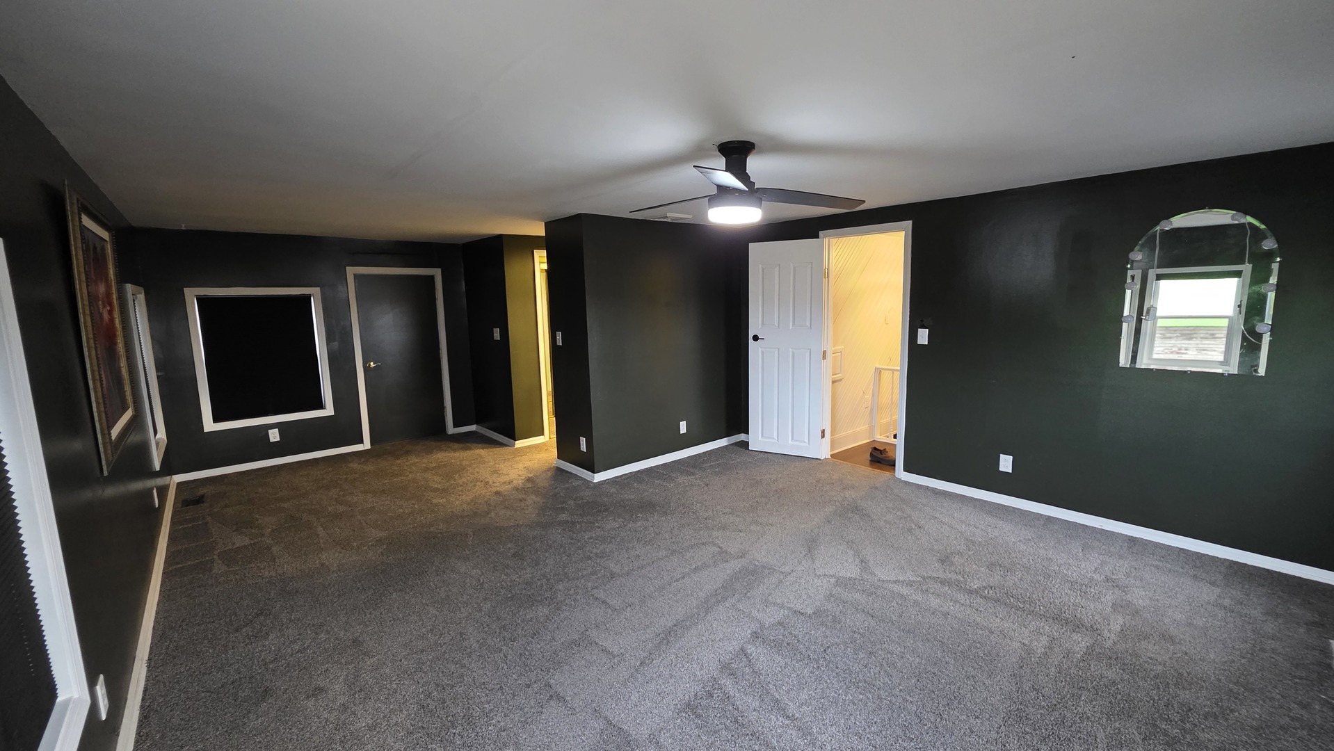 3494 Howlett Road Paw Paw, IL 61353 - Photo 11 of 21 a view of an empty room with a ceiling fan