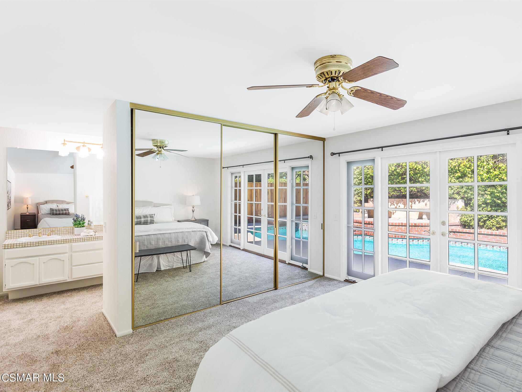 2978 Rikkard Drive Thousand Oaks, CA 91362 - Photo 13 of 21 a bedroom with a bed and a chandelier