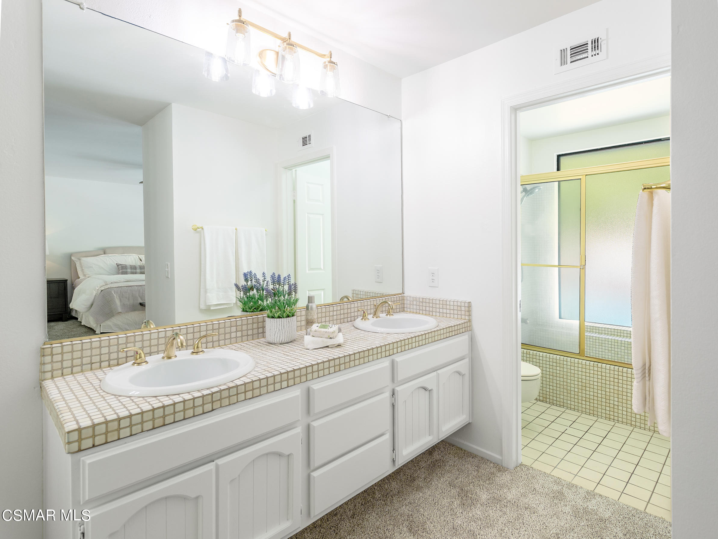 2978 Rikkard Drive Thousand Oaks, CA 91362 - Photo 14 of 21 a bathroom with a sink double vanity and a mirror