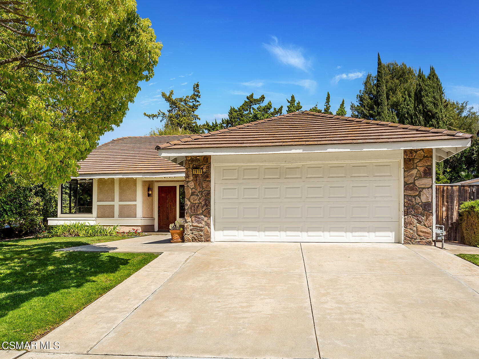 2978 Rikkard Drive Thousand Oaks, CA 91362 - Photo 20 of 21 a front view of a house with a yard