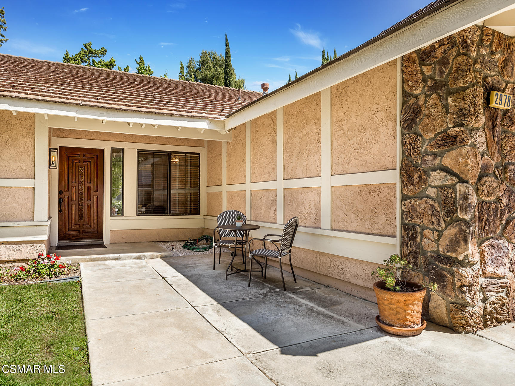 2978 Rikkard Drive Thousand Oaks, CA 91362 - Photo 21 of 21 a building outdoor space with patio furniture and potted plants