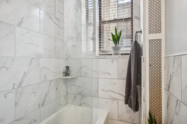 a bathroom with a bathtub