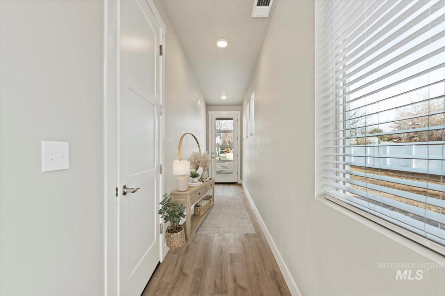 2791 West Palouse Street Boise, ID 83705 - Photo 2 of 26 Hall featuring light wood-style flooring and recessed lighting