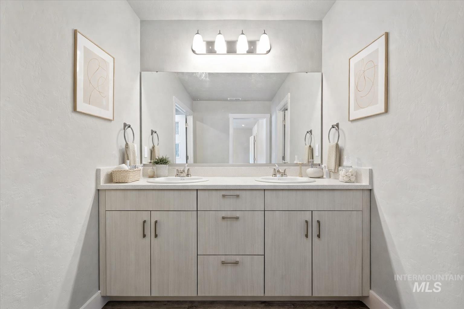 2791 West Palouse Street Boise, ID 83705 - Photo 10 of 26 Full bath featuring a textured wall and double vanity