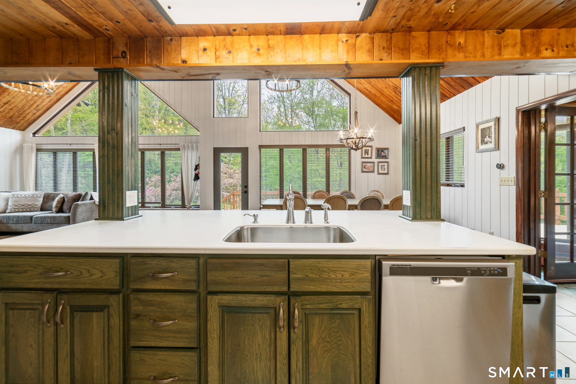72 Wild Cat Hill Road Harwinton, CT 06791 - Photo 11 of 40 a dining table with a sink and a mirror