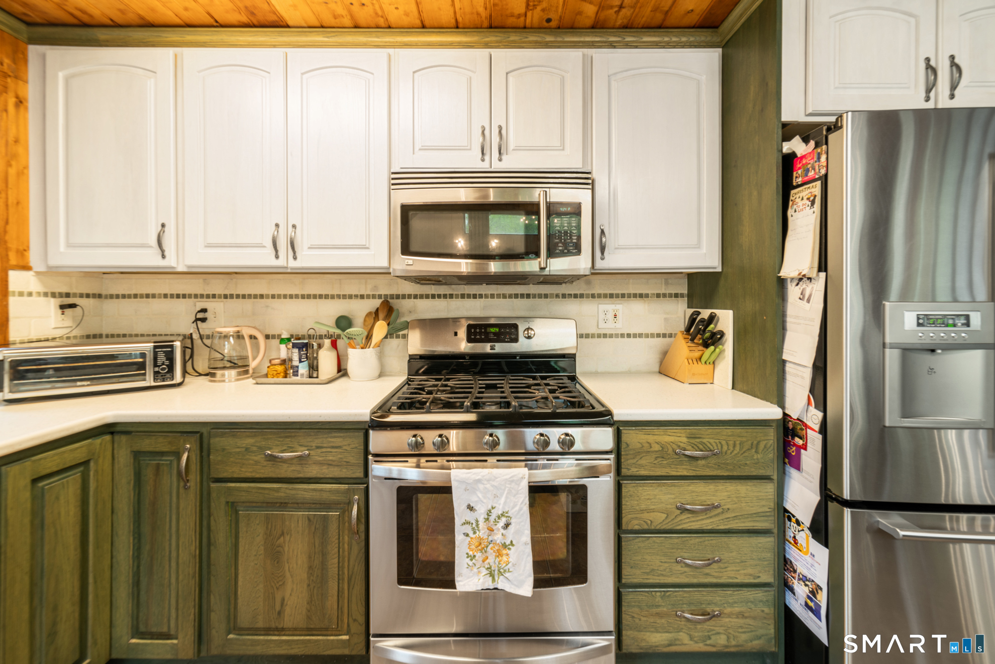 72 Wild Cat Hill Road Harwinton, CT 06791 - Photo 12 of 40 a kitchen with granite countertop a sink stove and refrigerator