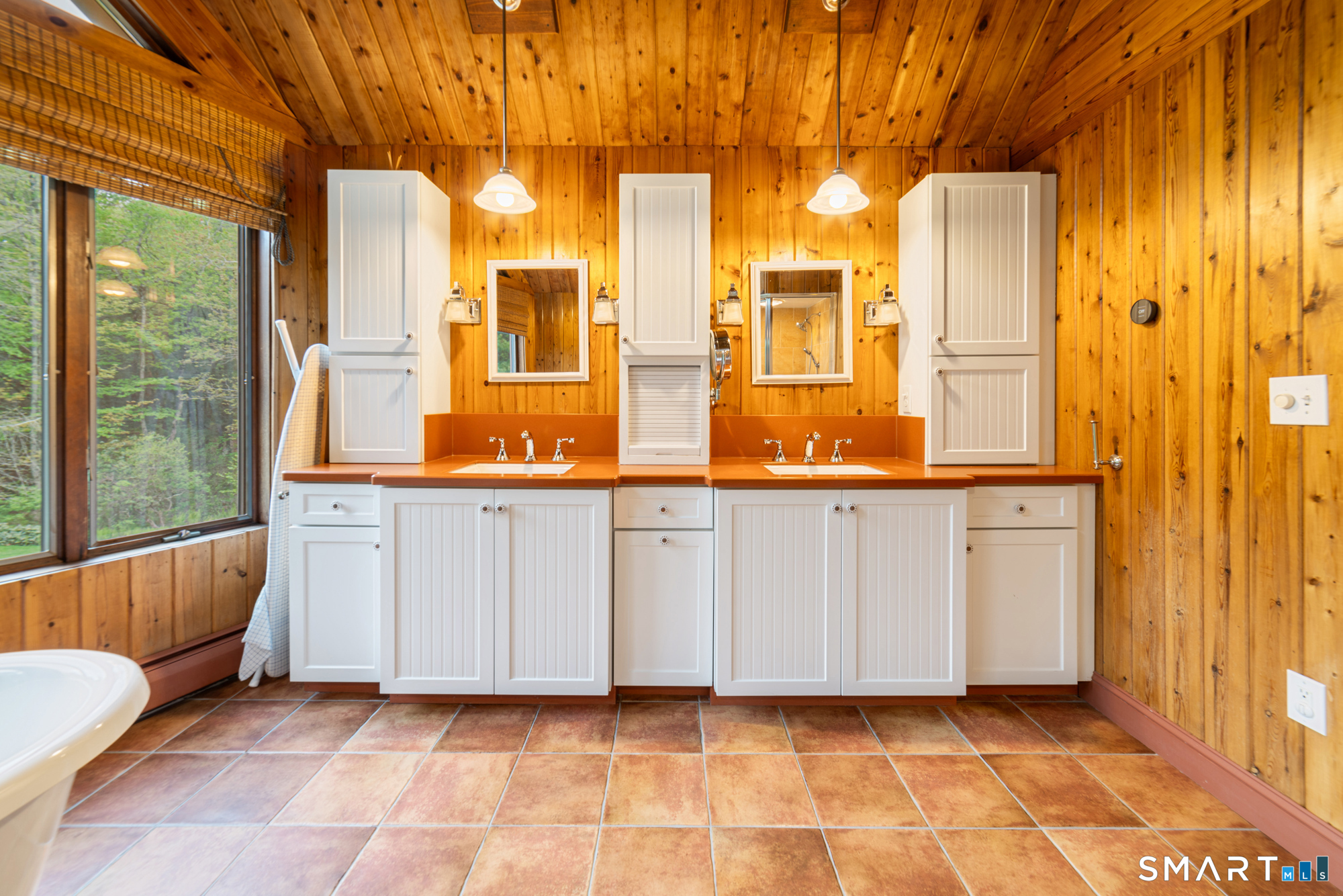 72 Wild Cat Hill Road Harwinton, CT 06791 - Photo 19 of 40 a view of a bathroom with a tub and shower