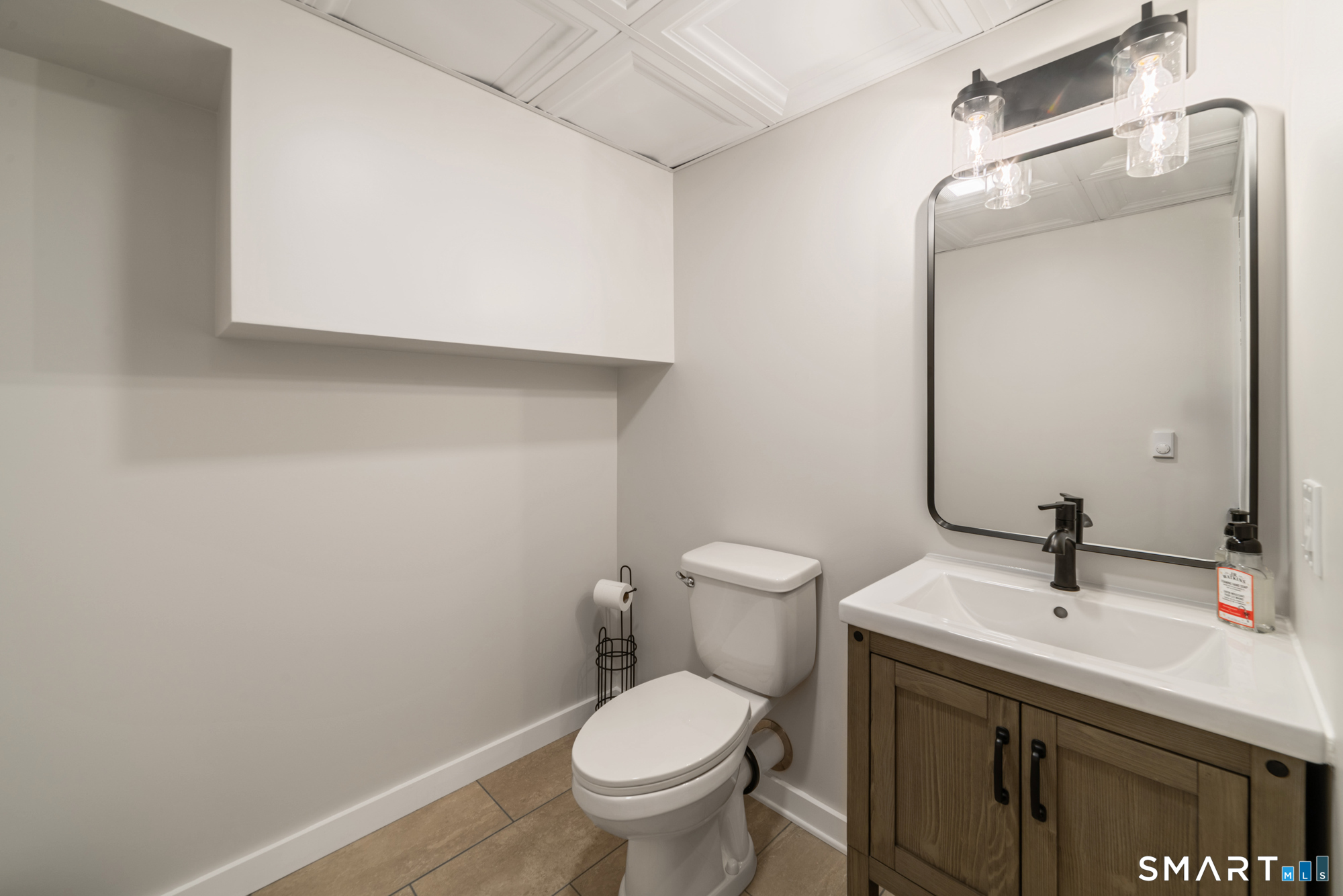 72 Wild Cat Hill Road Harwinton, CT 06791 - Photo 28 of 40 a bathroom with a sink and a toilet