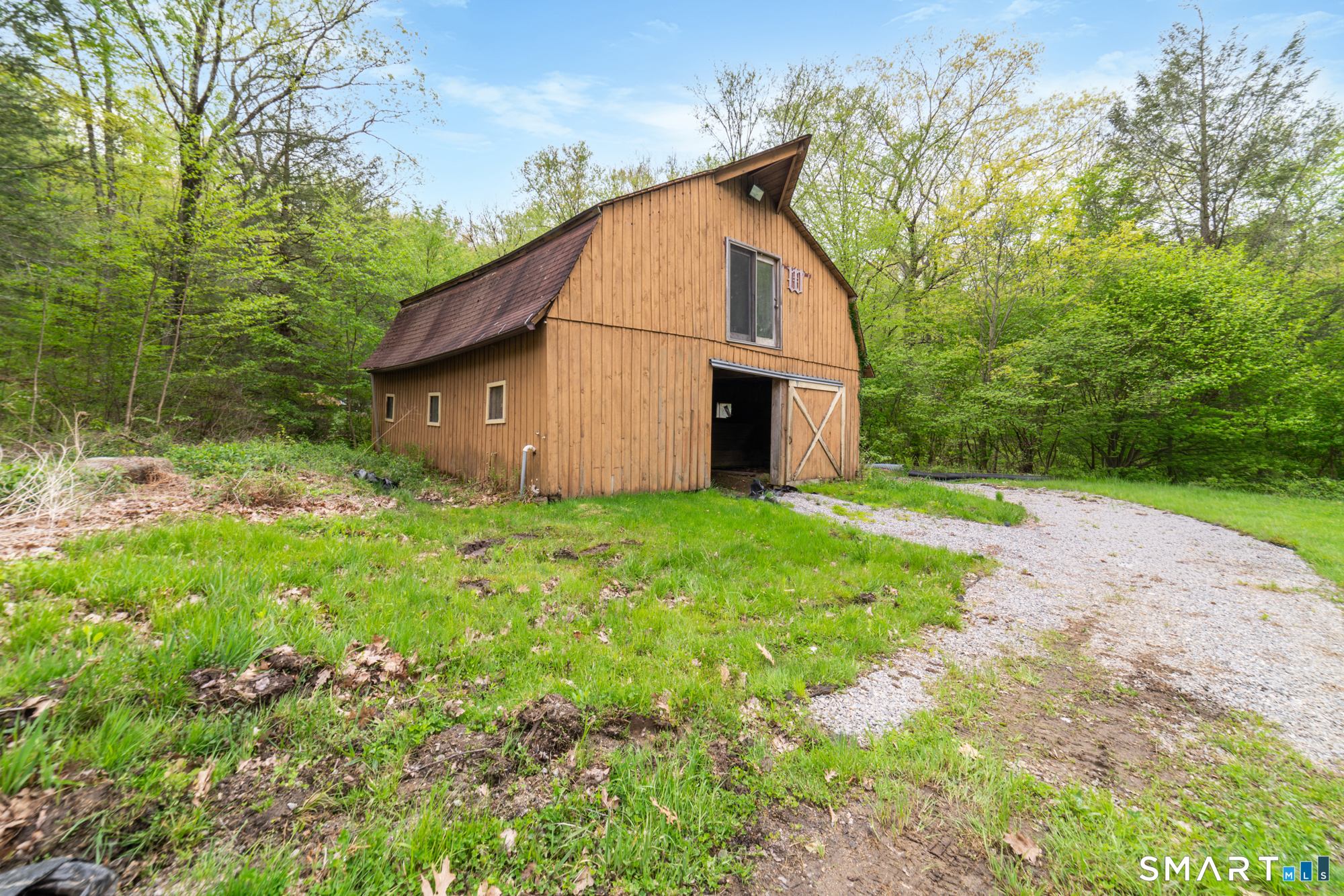 72 Wild Cat Hill Road Harwinton, CT 06791 - Photo 35 of 40 a view of a house with backyard and garden
