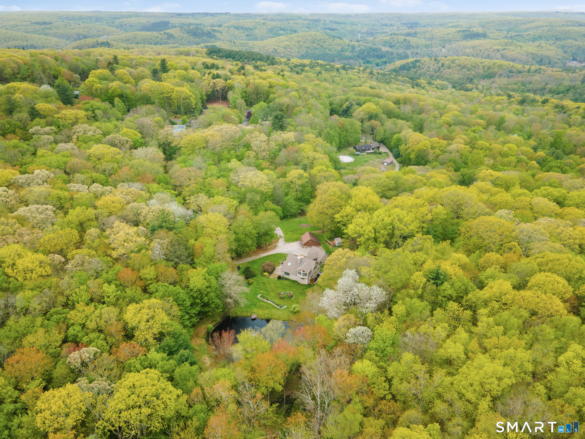72 Wild Cat Hill Road Harwinton, CT 06791 - Photo 36 of 40 a view of a big yard with lots of bushes