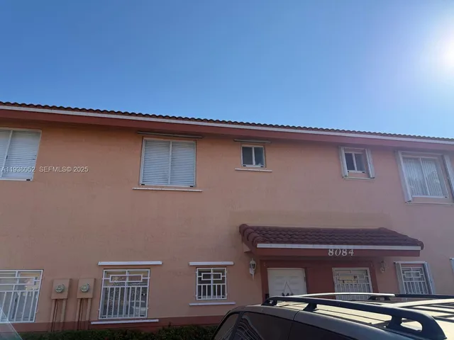 a view of balcony with furniture
