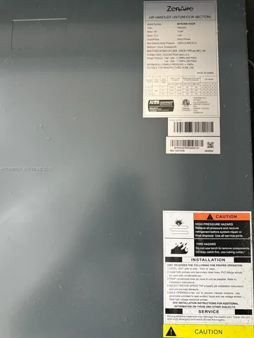 a view of a bedroom with bed and wooden floor