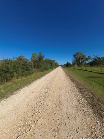 a view of a beach with a yard