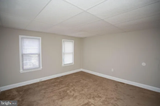 an empty room with an entryway
