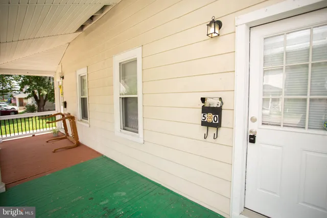 a view of front door and porch