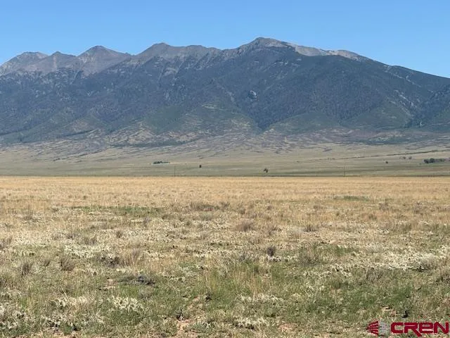 a view of ocean and mountains
