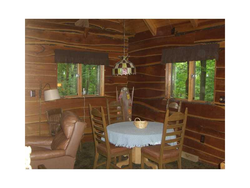 629 Rustic Ridge Road Champion, PA 15622 - Photo 11 of 25 Dining Room. VWindow views of the woods are everywhere!