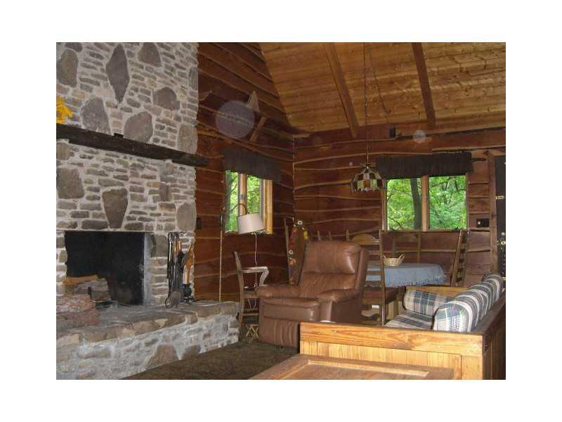 629 Rustic Ridge Road Champion, PA 15622 - Photo 7 of 25 Living Room. Wood is either cherry or oak through out the home