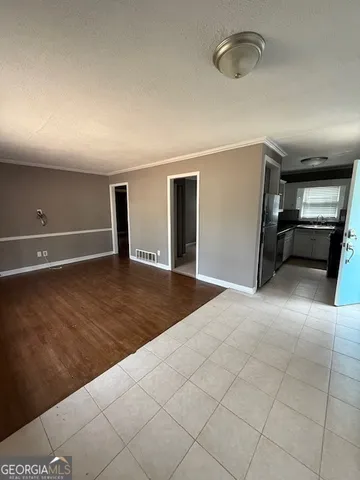 a view of a livingroom with a staircase