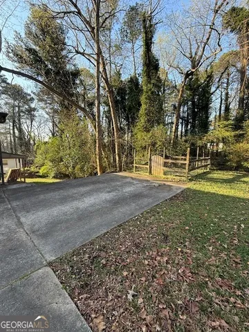 a view of road with trees
