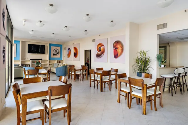 a view of a dining room with furniture