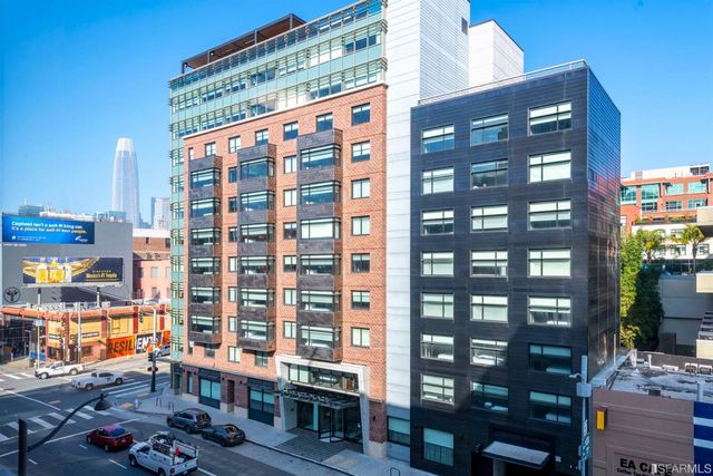 a view of a building from a balcony