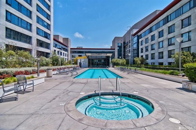 a room with furniture and wooden floor